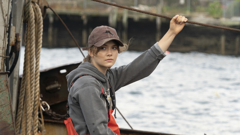 Emilia Jones on a fishing boat