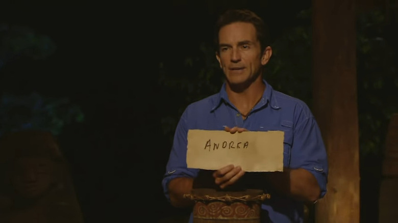 Jeff Probst holds sign saying "Andrea"