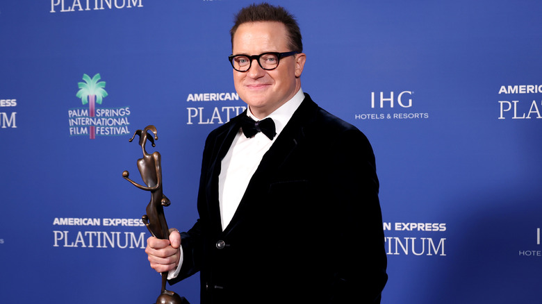 Brendan Fraser with award