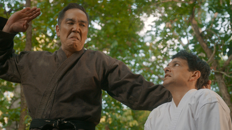 YUJI OKUMOTO and RALPH MACCHIO fighting