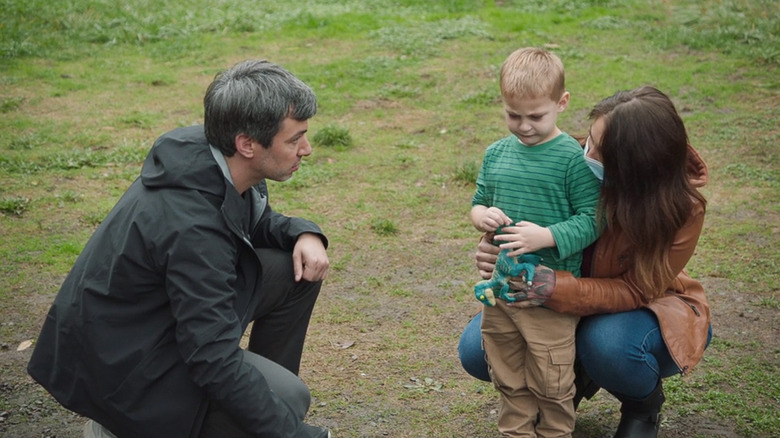 Nathan, Remy, and Amber on grass