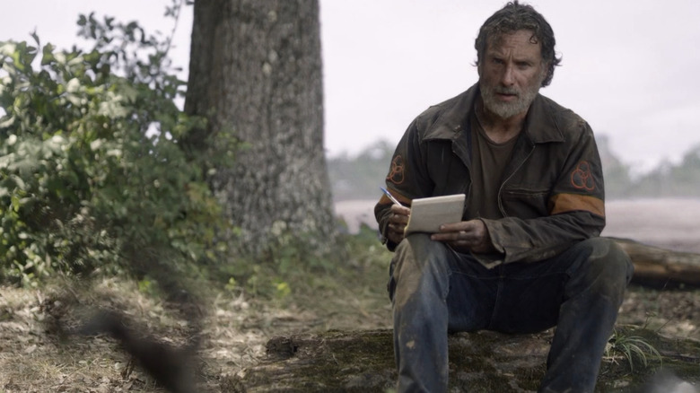 Rick writes a letter to Michonne during The Walking Dead finale