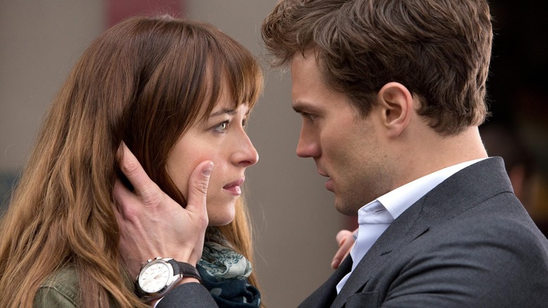 Anastasia and Christian Grey embracing