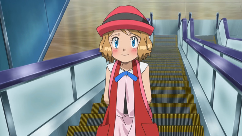 Serena blushing on an escalator