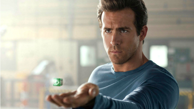 Ryan Reynolds reaching out with ring