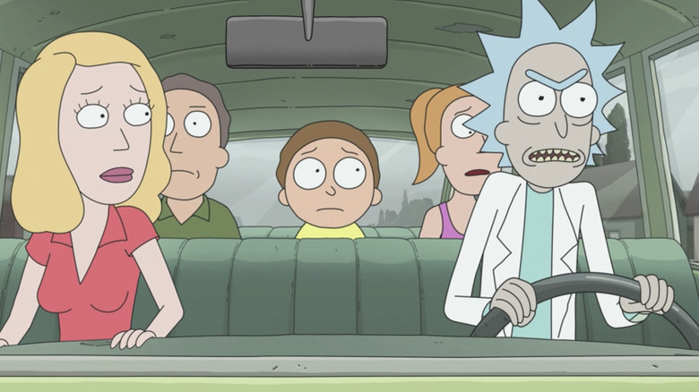 Rick driving a car with the Smith family