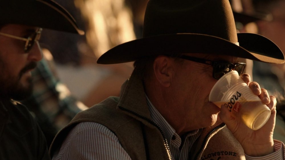 John Dutton carefully drinking a Coors on Yellowstone