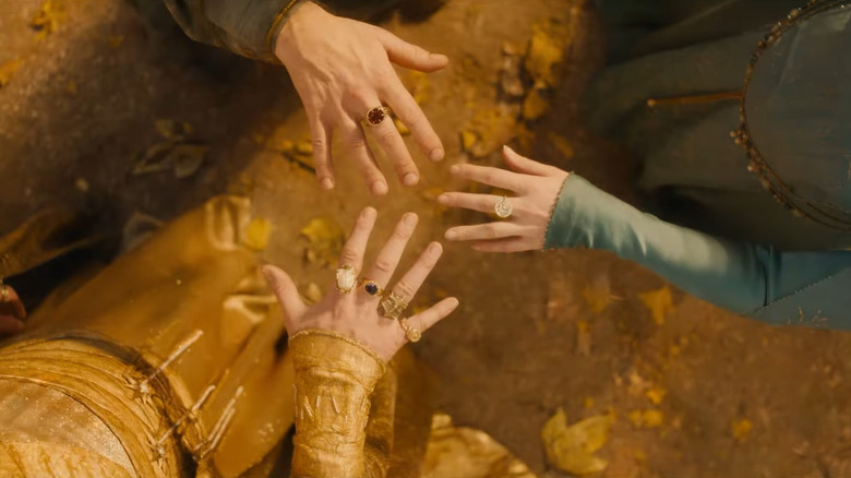 Hands showing the Three Elven Rings