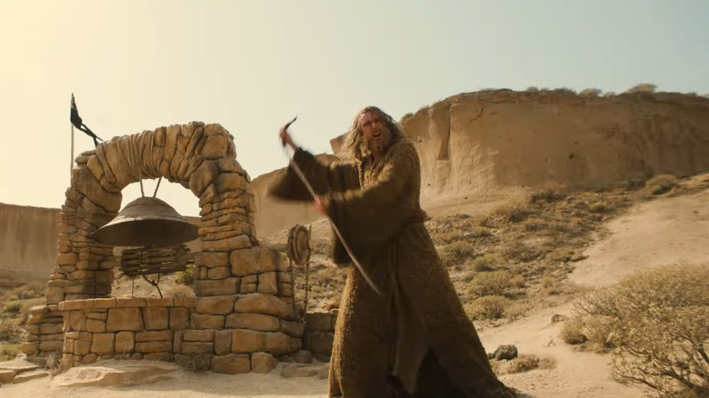 Gandalf next to well in desert