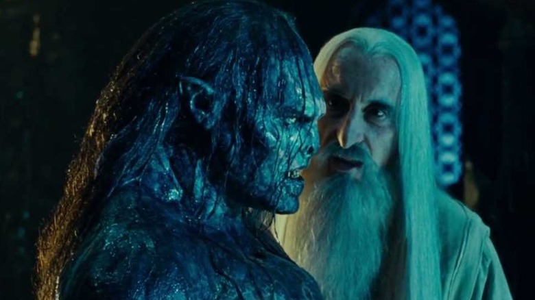 Lurtz stands next to Saruman