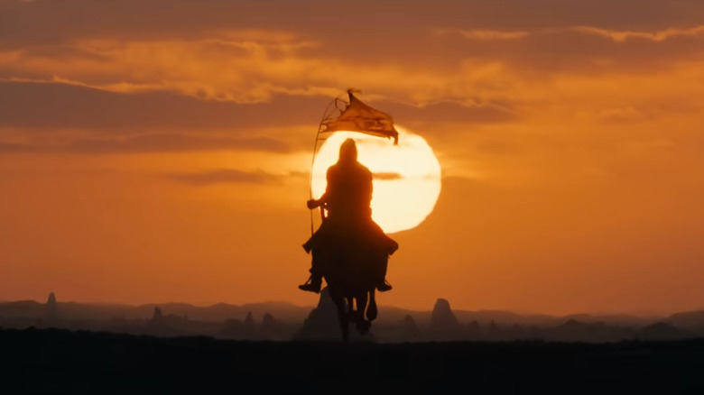 An Easterling rides in sunset