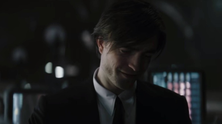 Bruce Wayne smirking