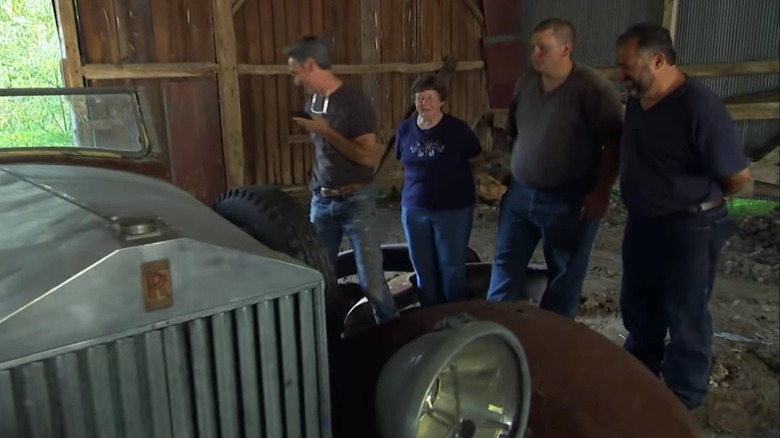 Mike Wolfe looking at a Rolls-Royce