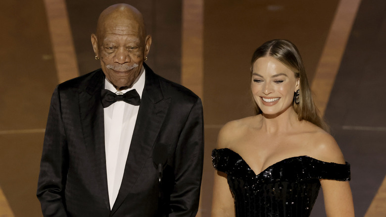 Morgan Freeman and Margot Robbie smiling