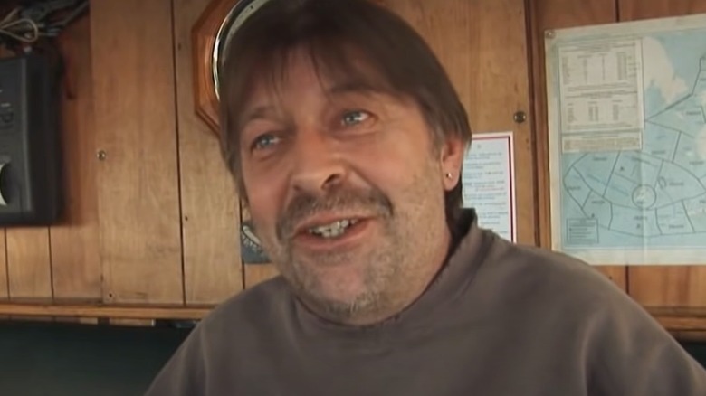 Phil Harris on boat smiling