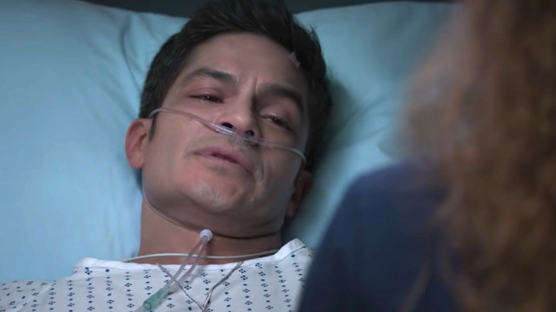 Neil Melendez in a hospital bed