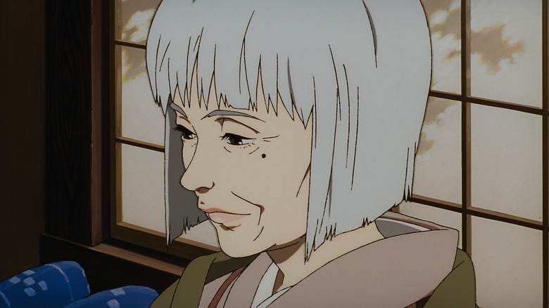 Elderly Chiyoko smiling sadly