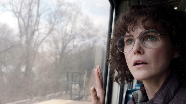 Elizabeth Jennings looks out a bus window in "The Americans" (2018)