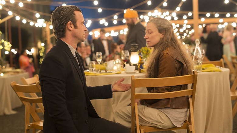 Kevin Garvey and Nora Durst sit at a table in "The Leftovers" (2017)