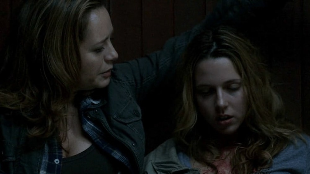 Ellen holds Jo as she dies