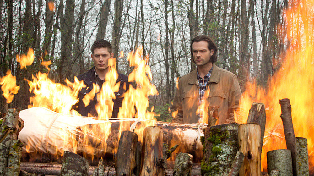 Dean and Sam with funeral pyre