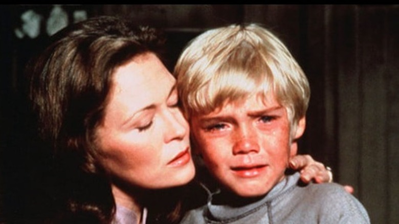 Timothy crying with his mother