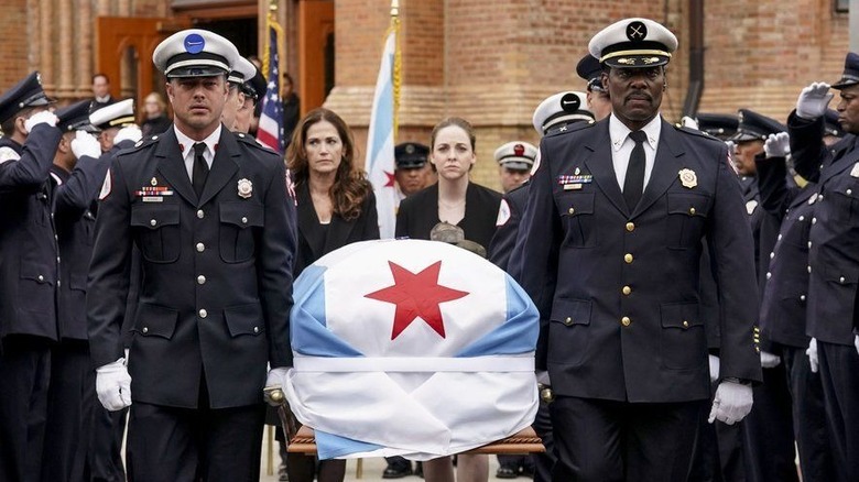 Seberide and Boden carry Benny's coffin Chicago PD