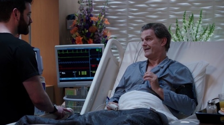 Cornelius sits in a hospital bed Chicago Med