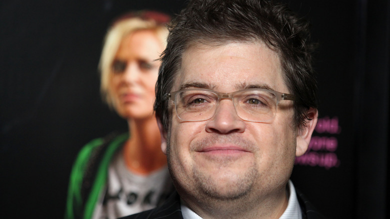 Patton Oswalt wearing glasses