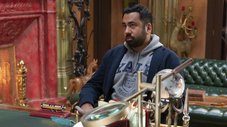 Kal Penn sitting