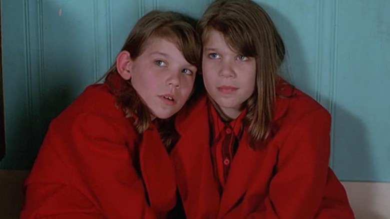 Two girls in red