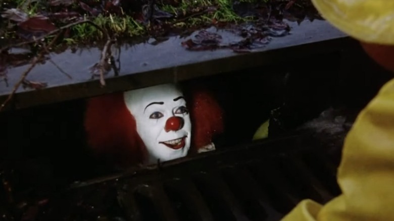 Pennywise says hello to Georgie from the sewer