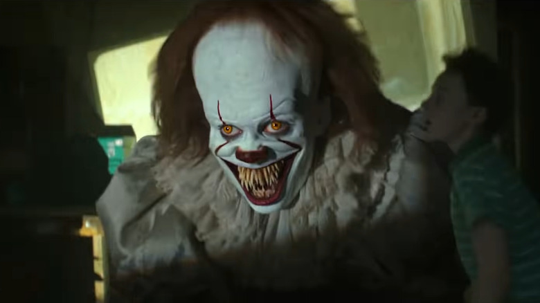 Pennywise erupts from the screen 