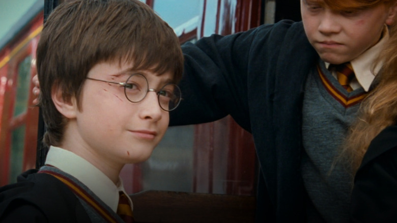 Harry Potter boarding the Hogwarts Express