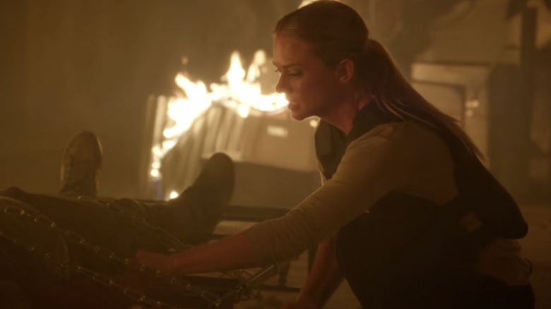 A.J. Cook in a burning building