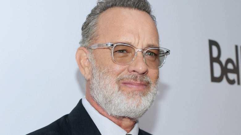 Tom Hanks smiling with a beard