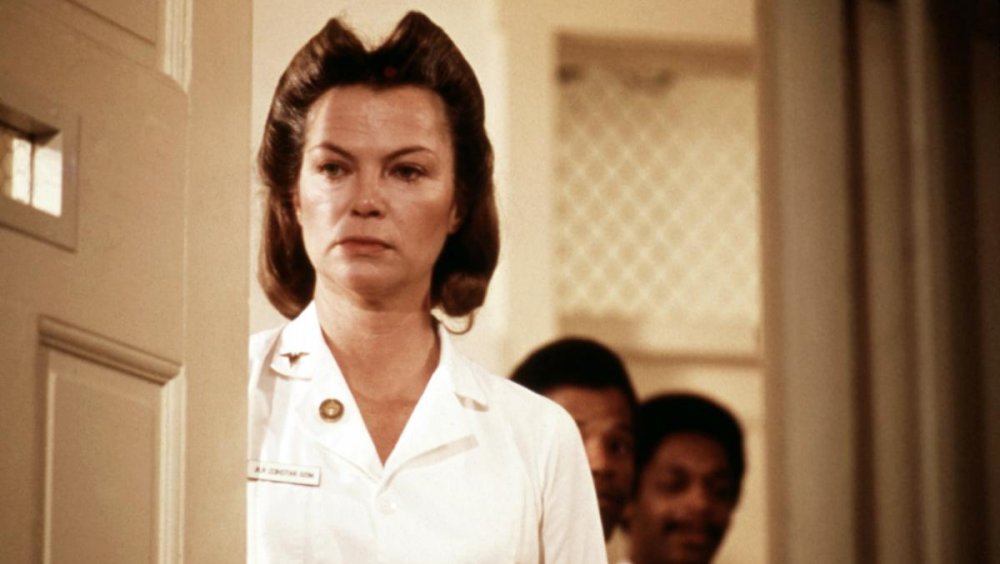 Nurse Ratched observing her patients in One Flew Over the Cuckoo's Nest