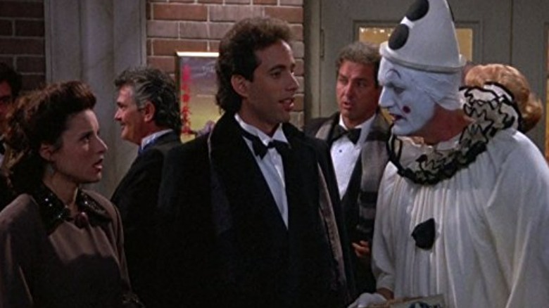 Jerry and Elaine talking to a clown