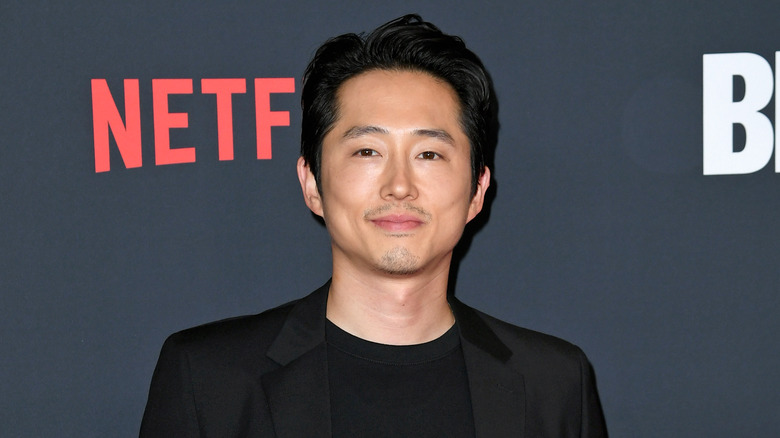 Steven Yeun at event