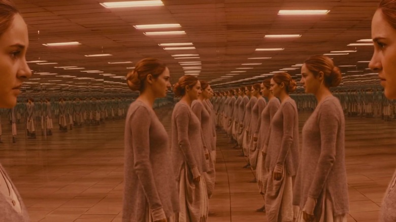 Tris in a room filled with her own reflections