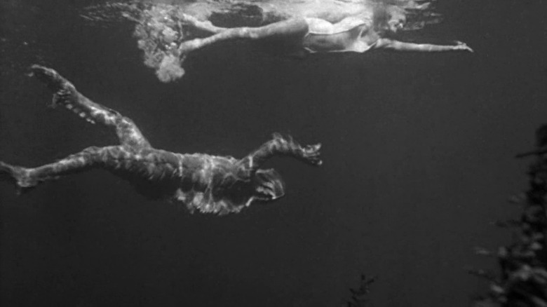 The Gill-man swimming underneath Kay Lawrence