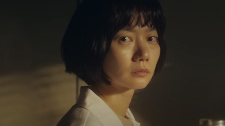 Bae Doona with grim expression