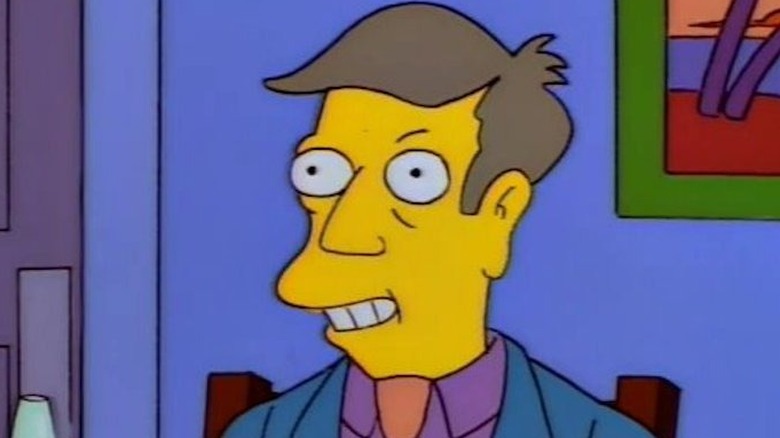 Principal Skinner holding a tray of steamed hams