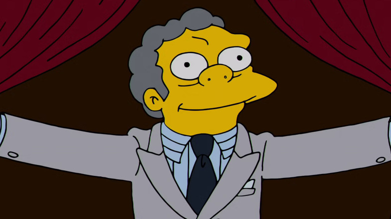 Moe Szyslak in a suit