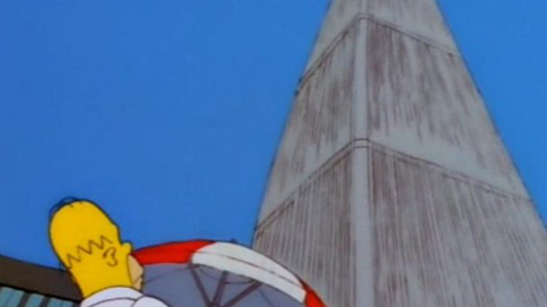 Homer looks up at one of the Twin Towers