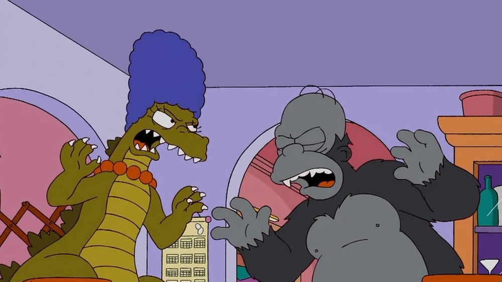 Marge and Homer Simpson as Godzilla and King Kong in "Wedding for Disaster"