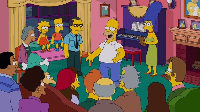 Homer Simpson talking to residents of Springfield