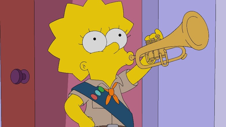 Lisa playing brass instrument