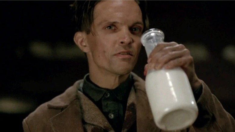 Walter holidng a glass of milk