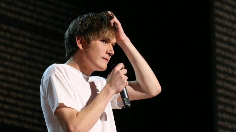 Bo Burnham scratching head